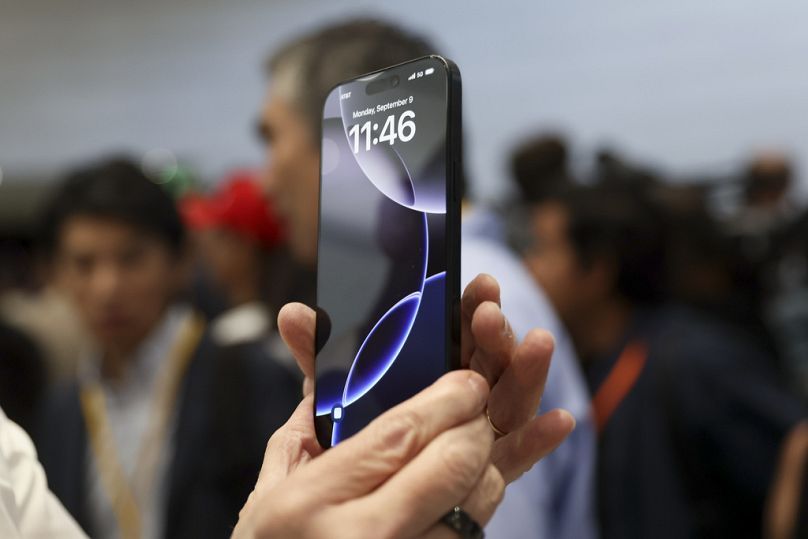 The new iPhone 16 is displayed during an announcement of new products at Apple headquarters Monday, Sept. 9, 2024, in Cupertino, Calif.